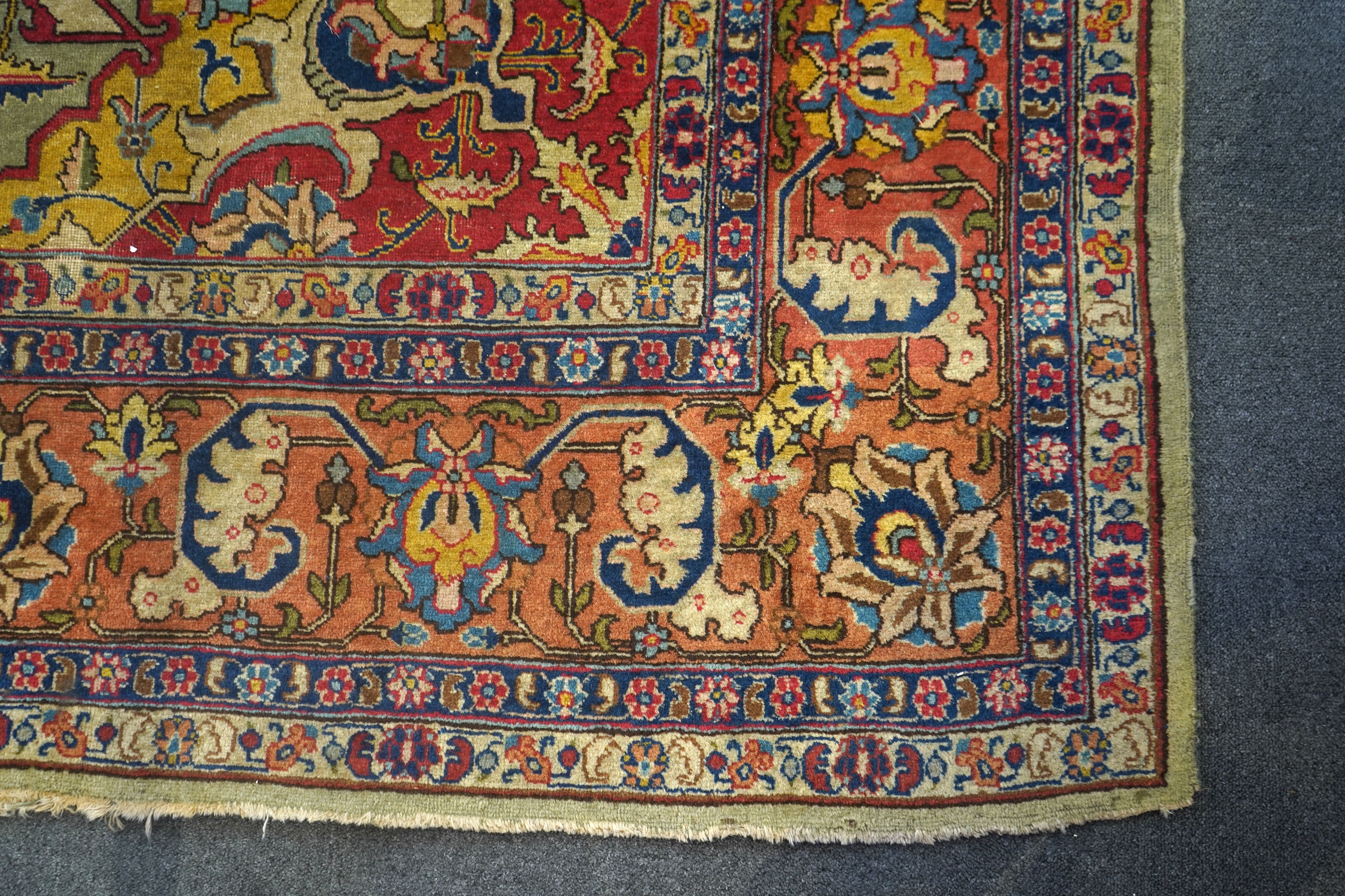 An early 20th century Tabriz pale green ground carpet